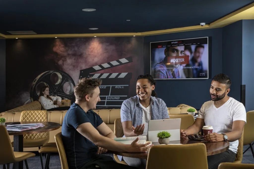 Students relaxing in the movie lounge at Study Inn Walnut Gardens, Exeter