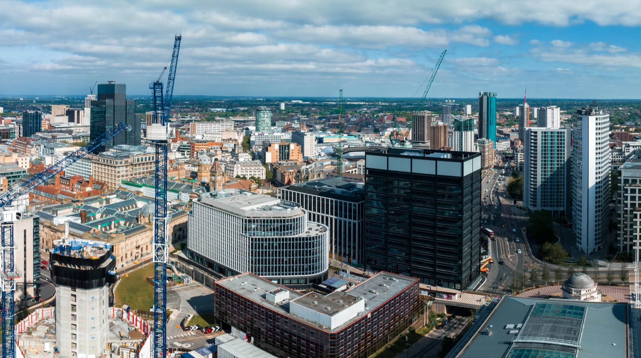 Aerial view of Birmingham city centre, England, with modern office buildings and the skyline