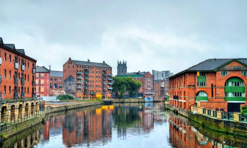River Aire and Leeds Minster among historic red-brick warehouses in Leeds city centre