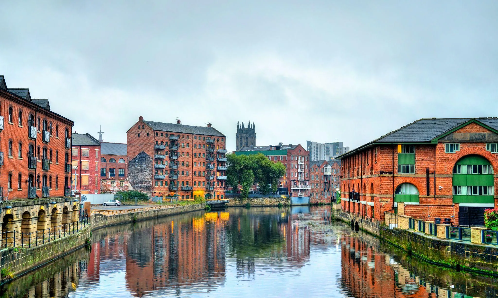 River Aire and Leeds Minster among historic red-brick warehouses in Leeds city centre