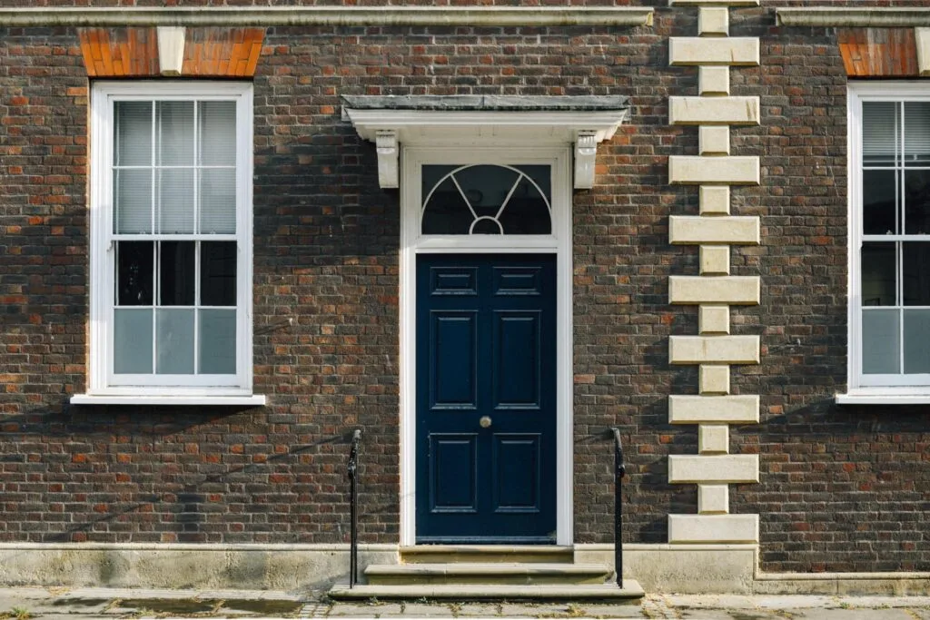 Front door of a traditional brick student house in Leeds