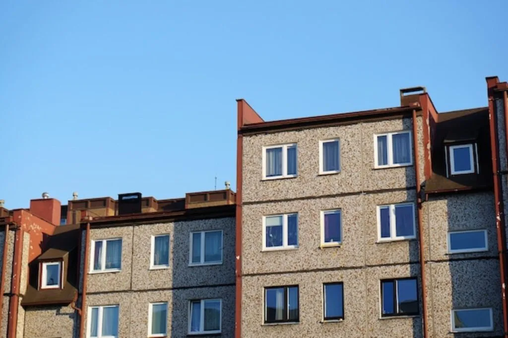 Student flats in Birmingham against a blue sky