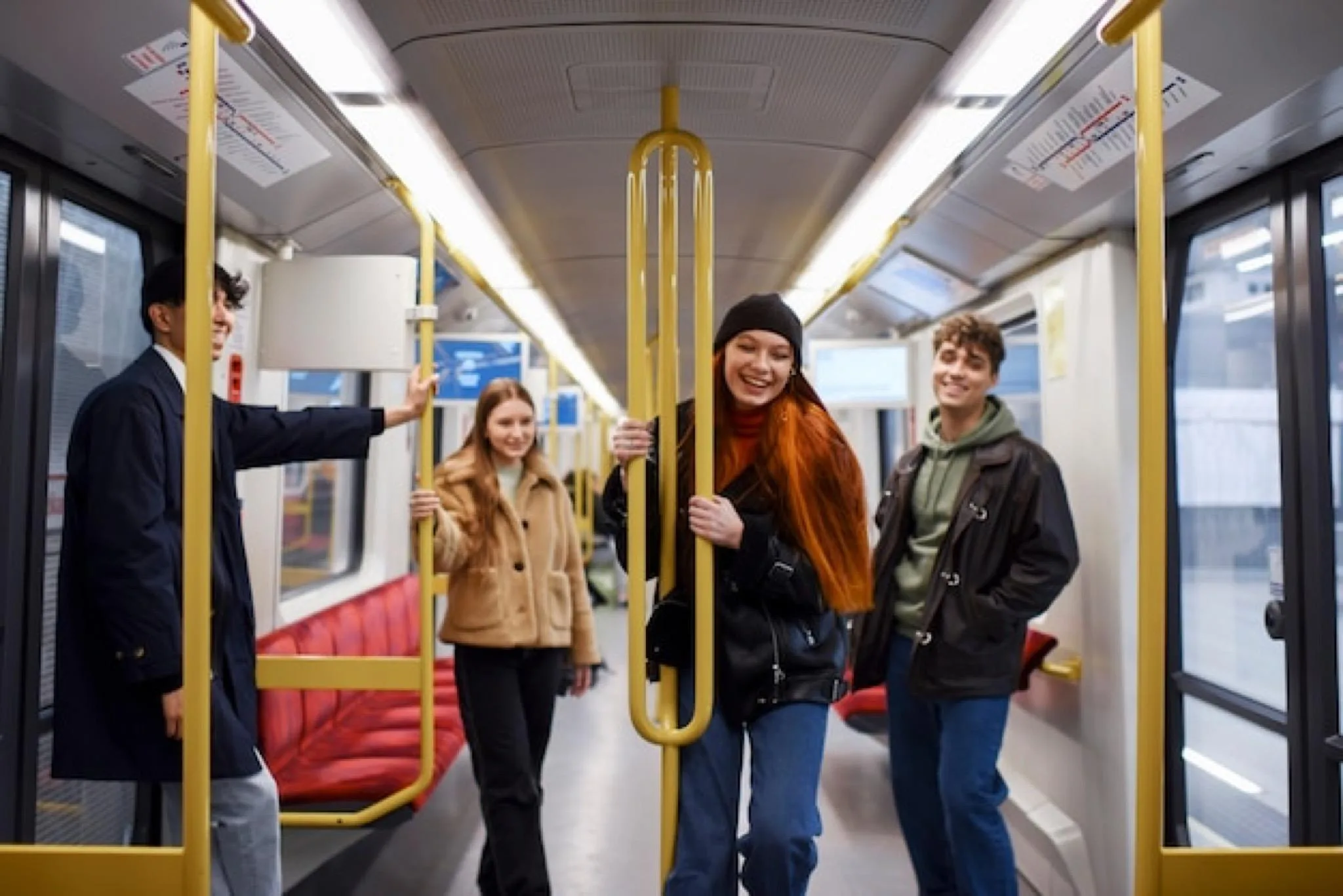 Students travelling on a tram in Birmingham
