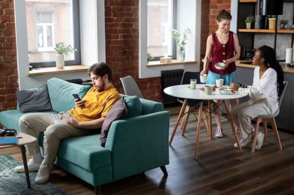 Students relaxing in a communal living area