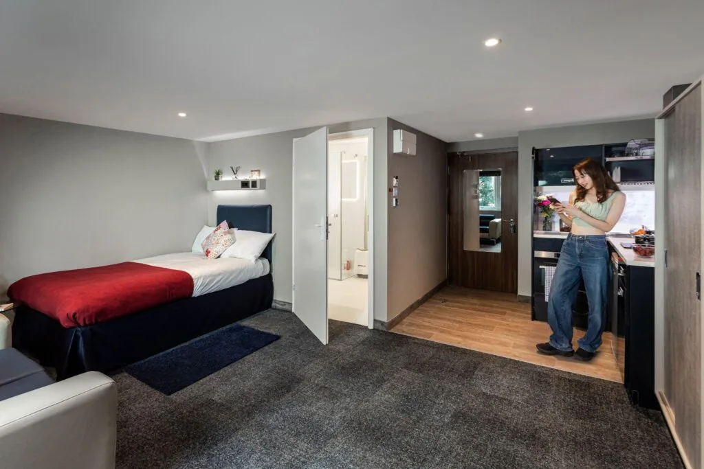 Student in a private studio room with an en-suite and kitchen area