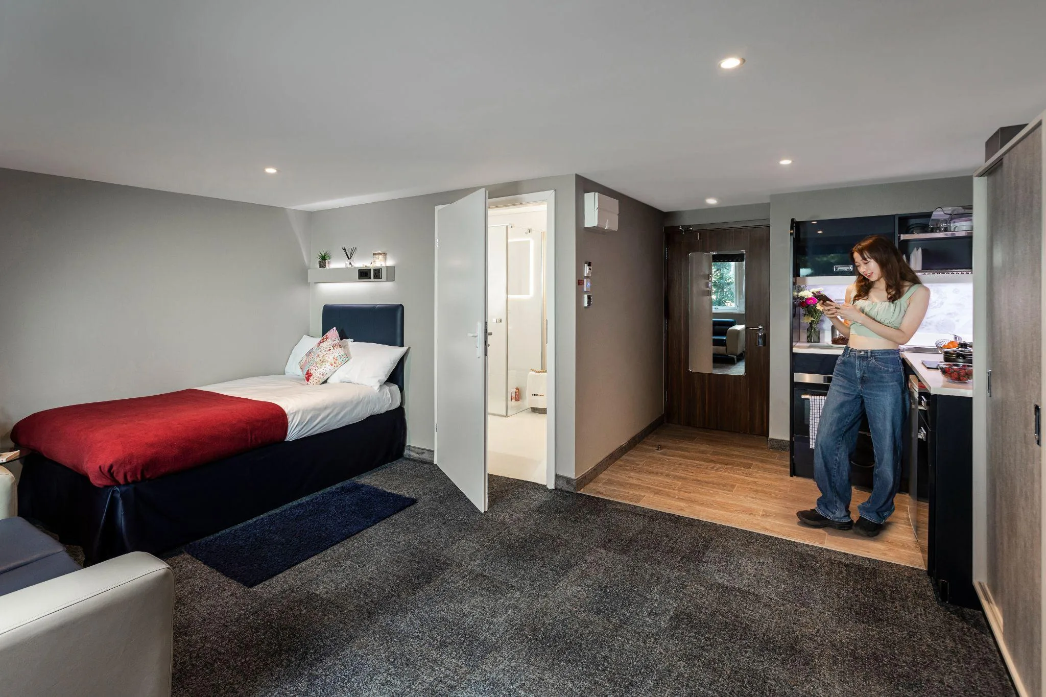 Student in a private studio room with an en-suite and kitchen area
